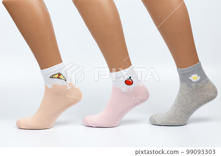 Socks on a white background. Socks on the leg. 99093303