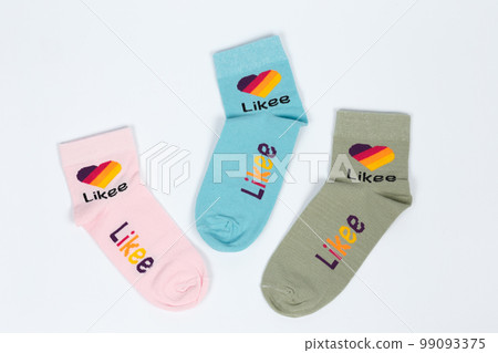 Socks on a white background. Socks on the leg. Socks on a white background. Socks on the leg. 99093375