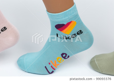 Socks on a white background. Socks on the leg. Socks on a white background. Socks on the leg. 99093376