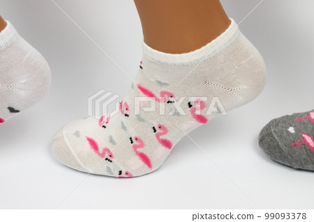 Socks on a white background. Socks on the leg. Socks on a white background. Socks on the leg. 99093378