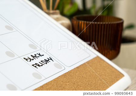 BLACK FRIDAY on calendar to remind important event appointment Monthly PLANNER. Magnetic board with the days of the month. Place to enter important matters schedule. Concept for business planning. 99093643