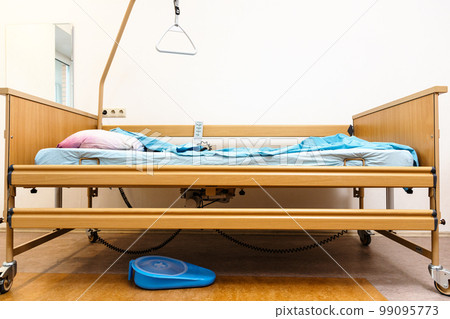 side view of electric hospital bed at home 99095773