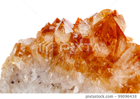Macro mineral stone Citrine in rock in crystals on a white background 99096438