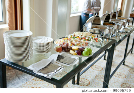 table set for a banquet table set for a banquet 99096799