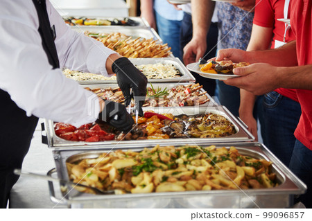 people at a banquet 99096857