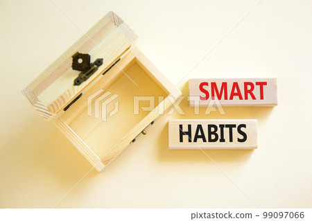 Smart habits symbol. Concept words Smart habits on wooden blocks. Beautiful white table white background. Wooden empthy chest. Business and smart habits concept. Copy space. 99097066