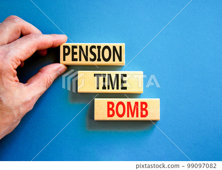 Pension time bomb symbol. Concept words Pension time bomb on wooden blocks on a beautiful blue table blue background. Businessman hand. Business pension time bomb concept. Copy space. 99097082