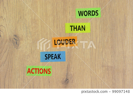 Actions speak louder words symbol. Concept words Actions speak louder than words on colored paper. Beautiful wooden background. Business new mindset for results concept. Copy space. 99097148