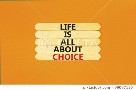 Choice and life symbol. Concept words Life is all about choice on wooden stick. Beautiful orange table orange background. Business choice and life concept. Copy space. 99097150