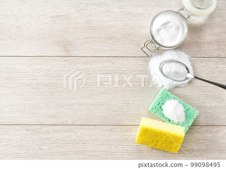 Eco friendly home care detergent with baking soda, eco friendly concept, top view. Eco friendly home care detergent with baking soda, eco friendly concept, top view. 99098495