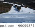 Overlooking the slopes of the ski resort 99099875