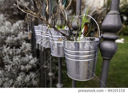 Metal pots with plants 99105158