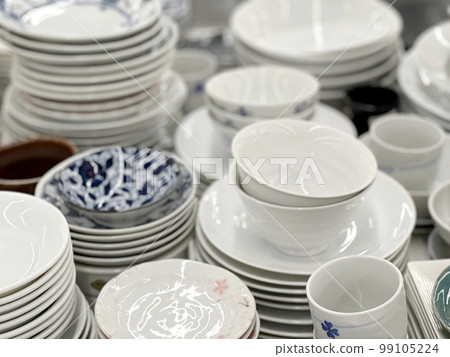 A lot of stacked pottery tableware A lot of stacked pottery tableware 99105224