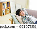 A young woman relaxing on the sofa Relax Nap Break Nap 99107359
