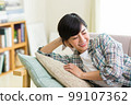 A young woman relaxing on the sofa Relax Nap Break Nap 99107362