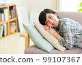 A young woman relaxing on the sofa Relax Nap Break Nap 99107367