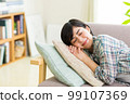 A young woman relaxing on the sofa Relax Nap Break Nap 99107369