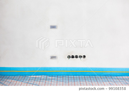 Expansion tape for underfloor heating between floor and wall with reflective film for underfloor heating, concept of heated floor 99108358