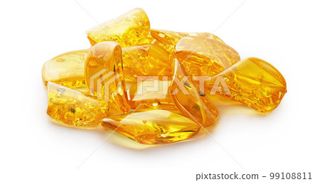 Transparent polished pieces of yellow amber on a white background. Sun stone. Natural mineral material for jewelry. Amber texture. Copal. Ancient fossil resin Transparent polished pieces of yellow amber on a white background. Sun stone. Natural mineral material for jewelry. Amber texture. Copal. Ancient fossil resin 99108811