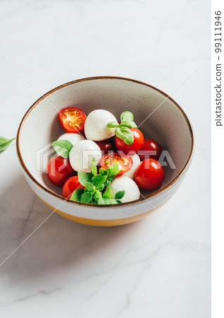 Freshly made italian salad caprese 99111946