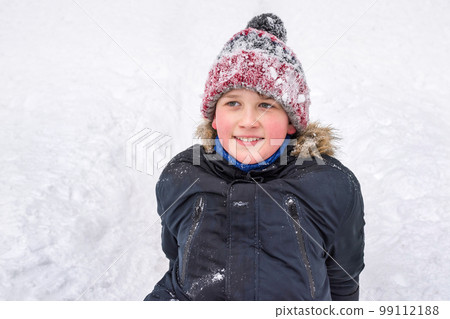 Winter portrait of a child boy outdoors. Winter vacation and holidays Winter portrait of a child boy outdoors. Winter vacation and holidays 99112188