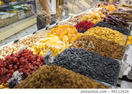 Different types and varieties for sale in the market. Dried fruits Different types and varieties for sale in the market. Dried fruits 99112626