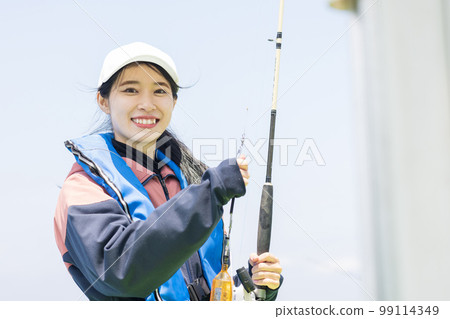 Cute woman fishing 99114349