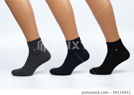 Socks on a white background. Socks on the leg. 99114451