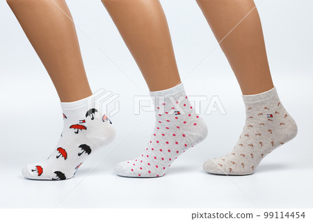 Socks on a white background. Socks on the leg. 99114454