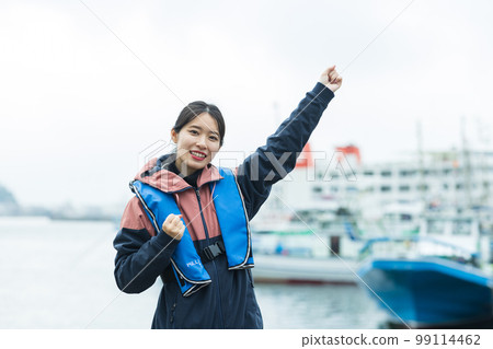 Cute woman enjoying fishing 99114462
