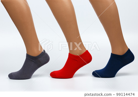 Socks on a white background. Socks on the leg. 99114474