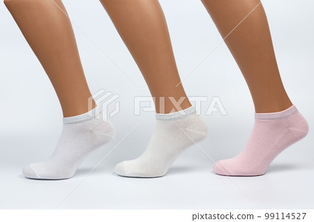 Socks on a white background. Socks on the leg. 99114527