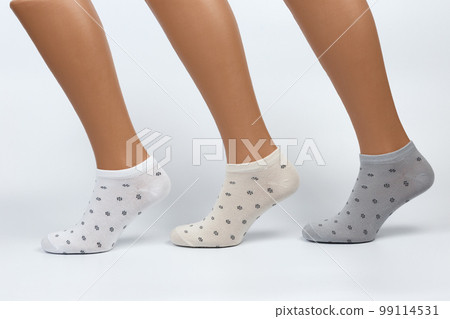 Socks on a white background. Socks on the leg. 99114531