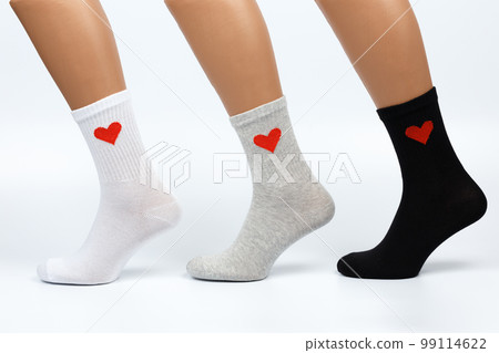 Socks on a white background. Socks on the leg. 99114622
