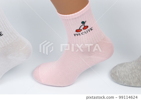 Socks on a white background. Socks on the leg. Socks on a white background. Socks on the leg. 99114624