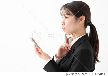 Business women smartphone worries Business women smartphone worries 99115041