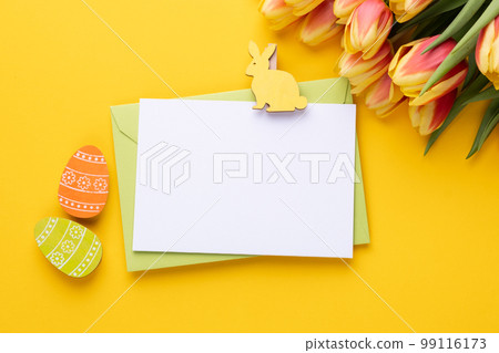 Template for Easter greeting card. Blank card with an envelope and bouquet of tulips 99116173