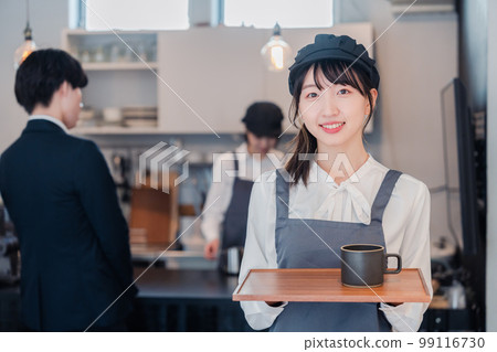 Cafe staff working with a smile Cafe staff working with a smile 99116730