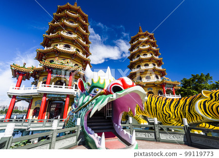 Architecture view of the Dragon and Tiger Pagodas in Lotus Pond of Kaohsiung, Taiwan. it is a temple located at Lotus Pond. Architecture view of the Dragon and Tiger Pagodas in Lotus Pond of Kaohsiung, Taiwan. it is a temple located at Lotus Pond. 99119773