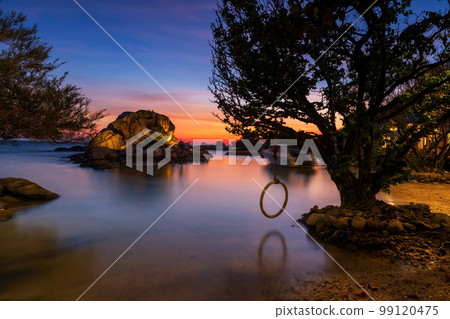 Small island surrounding by sea at dusk with twilight sky, Ko Man Klang 99120475