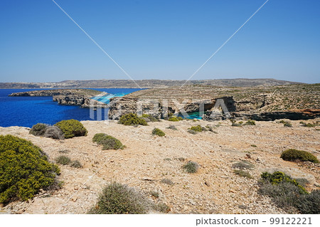 View to european Comino island with blue lagoon in Malta View to european Comino island with blue lagoon in Malta 99122221