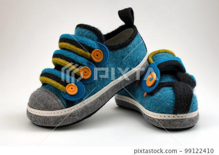 Children's low top shoes. Kids fashionable sneakers made of felt. Colorful baby shoes with velcro strap 99122410