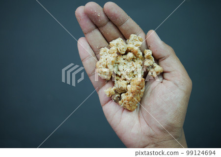 close up of granola Musli on hand close up of granola Musli on hand 99124694