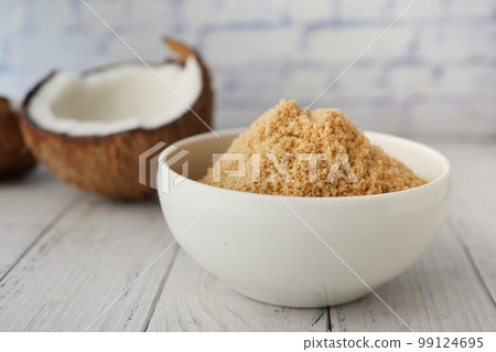 coconut sugar in a white bowl on table coconut sugar in a white bowl on table 99124695