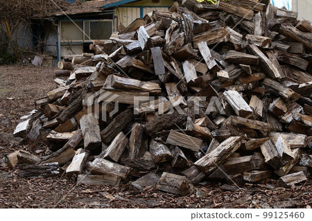 Stacked firewood 99125460