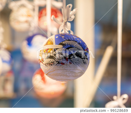 Christmas ball with a winter landscape Christmas tree toy in the store 99128689