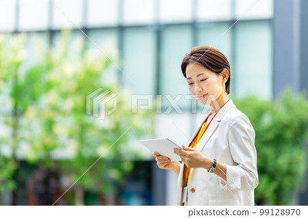 Outside business woman Outside business woman 99128970
