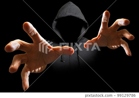 Suspicious person wearing a hoodie approaching Suspicious person wearing a hoodie approaching 99129786