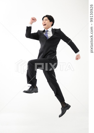 Businessman jump 99130926