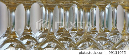 Arrangement of champagne glasses in order in the kitchen before the party 99131055